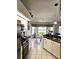 Spacious kitchen boasting a breakfast nook and water views at 15001 Appleton Blvd, Port Charlotte, FL 33981
