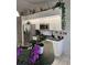Well-equipped kitchen with microwave and stylish backsplash at 15001 Appleton Blvd, Port Charlotte, FL 33981