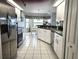 Modern kitchen with stainless steel appliances and ample counter space at 15001 Appleton Blvd, Port Charlotte, FL 33981