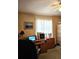 Bright home office with a desk, chair, and large window at 15001 Appleton Blvd, Port Charlotte, FL 33981