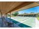 Enjoyable community shuffleboard courts under covered area at 600 Bramblewood Ln, Englewood, FL 34223