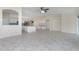 Open concept living room with high ceilings and tile floors at 9660 Miami Cir, Port Charlotte, FL 33981