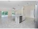 Modern kitchen with stainless steel appliances and an island at 9660 Miami Cir, Port Charlotte, FL 33981