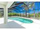 Enjoy this lovely screened pool area at 9660 Miami Cir, Port Charlotte, FL 33981