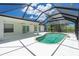 Screened pool and patio area at 9660 Miami Cir, Port Charlotte, FL 33981