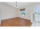 Dining area with hardwood floors and a chandelier at 9660 Miami Cir, Port Charlotte, FL 33981