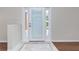 Interior entryway with white door and tiled flooring at 9660 Miami Cir, Port Charlotte, FL 33981