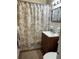 Clean bathroom with shower/tub combo and vanity at 22216 Midway Blvd, Port Charlotte, FL 33952