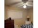 Spacious bedroom with ample closet space and window coverings at 22216 Midway Blvd, Port Charlotte, FL 33952