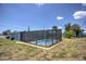 Relaxing pool area with screened enclosure at 22216 Midway Blvd, Port Charlotte, FL 33952