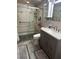 Updated bathroom with a walk-in shower and modern vanity at 22216 Midway Blvd, Port Charlotte, FL 33952