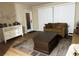 Living room with brown couch, coffee table, and white dresser at 22216 Midway Blvd, Port Charlotte, FL 33952