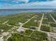 Beautiful aerial view of the property, showcasing the home and surrounding landscape near the water at 5039 Parker St, Port Charlotte, FL 33981