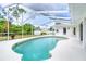 Relaxing screened pool area with updated pool and spacious patio deck at 5039 Parker St, Port Charlotte, FL 33981