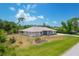 One story home with mature landscaping and a spacious yard at 5039 Parker St, Port Charlotte, FL 33981