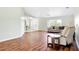 Bright living room with wood-look floors, neutral walls, and ample natural light at 5039 Parker St, Port Charlotte, FL 33981