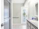 Bathroom with shower, pool view, and vanity at 5039 Parker St, Port Charlotte, FL 33981