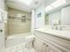 Updated bathroom with tile shower/tub and white vanity at 7486 Palm Island Dr # 2422, Placida, FL 33946