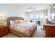Main bedroom with ocean view and king-size bed at 7486 Palm Island Dr # 2422, Placida, FL 33946