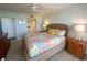 Bright bedroom with a comfortable queen bed and private balcony access at 7486 Palm Island Dr # 2422, Placida, FL 33946