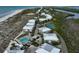 Aerial view of community near beach and waterway at 7486 Palm Island Dr # 2422, Placida, FL 33946