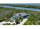 Aerial view of waterfront clubhouse at 7486 Palm Island Dr # 2422, Placida, FL 33946