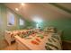 Cozy bedroom with two twin beds, and a light teal accent wall at 7486 Palm Island Dr # 2422, Placida, FL 33946