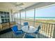 Relaxing screened porch overlooking the beach and ocean at 7486 Palm Island Dr # 2422, Placida, FL 33946
