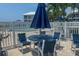 Relaxing patio area with table and chairs at 7486 Palm Island Dr # 2422, Placida, FL 33946