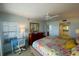 Bedroom with a work station and a comfortable bed with ocean view at 7486 Palm Island Dr # 2422, Placida, FL 33946
