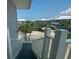 View of the community with lush landscaping and ocean view at 7486 Palm Island Dr # 2422, Placida, FL 33946