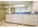 Elegant bathroom with double vanity, granite countertop, and large walk-in shower at 7486 Palm Island Dr # 2422, Placida, FL 33946