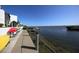 Community Kayak dock with colorful kayaks available for residents at 2955 N Beach Rd # A-415, Englewood, FL 34223