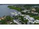 Aerial view of waterfront community showing building and parking at 2955 N Beach Rd # A-415, Englewood, FL 34223