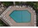 Relaxing aerial view of community pool and surrounding deck at 2955 N Beach Rd # A-415, Englewood, FL 34223