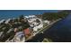Aerial view of the community, showing buildings and waterfront access at 2955 N Beach Rd # A-415, Englewood, FL 34223