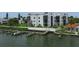 Waterfront property with private boat dock and lush landscaping at 2955 N Beach Rd # A-415, Englewood, FL 34223