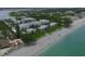 Aerial view of waterfront condos with beach access at 2955 N Beach Rd # A-415, Englewood, FL 34223