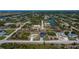 Wide aerial view of community and canal at 10401 Sunday Dr, Port Charlotte, FL 33981