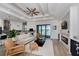 Open living space featuring a fireplace and access to the pool at 10401 Sunday Dr, Port Charlotte, FL 33981