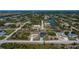 Wide aerial view of community and canal at 10401 Sunday Dr, Port Charlotte, FL 33981