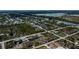 Aerial view of neighborhood with waterfront access at 10401 Sunday Dr, Port Charlotte, FL 33981