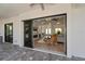 Open living area with sliding glass doors leading to patio at 10401 Sunday Dr, Port Charlotte, FL 33981