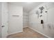 Spacious walk-in closet with wire shelving and carpeting at 15889 Viscount Cir, Port Charlotte, FL 33981