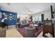 Spacious living room with nautical decor and comfortable seating at 15889 Viscount Cir, Port Charlotte, FL 33981