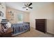 bedroom with a dresser and ceiling fan at 15889 Viscount Cir, Port Charlotte, FL 33981