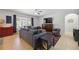 Comfortable living room with large TV and ample seating at 15889 Viscount Cir, Port Charlotte, FL 33981