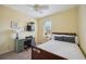Charming bedroom with a double bed, desk and ceiling fan at 15889 Viscount Cir, Port Charlotte, FL 33981
