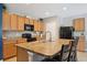 Modern kitchen with island and stainless steel appliances at 15889 Viscount Cir, Port Charlotte, FL 33981