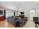 Comfortable living room with large TV and ample seating at 15889 Viscount Cir, Port Charlotte, FL 33981